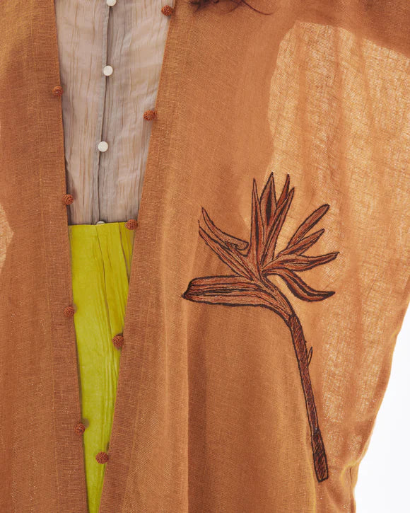 Monochrome Bird of Paradise on Rust Abaya